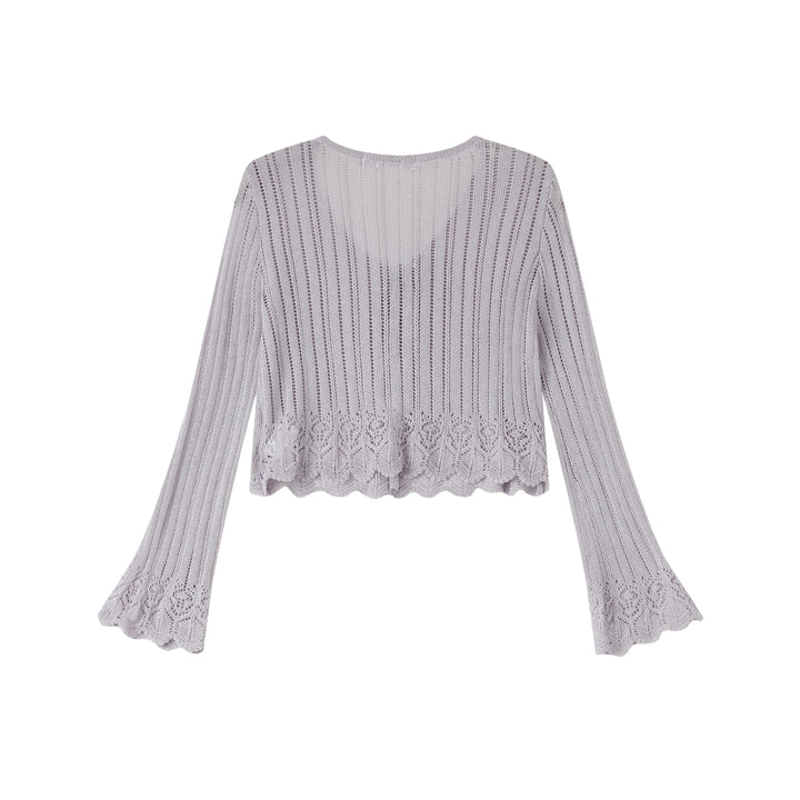 An image of a   OW83US6 Knit Cardigan by  Mirra Masa