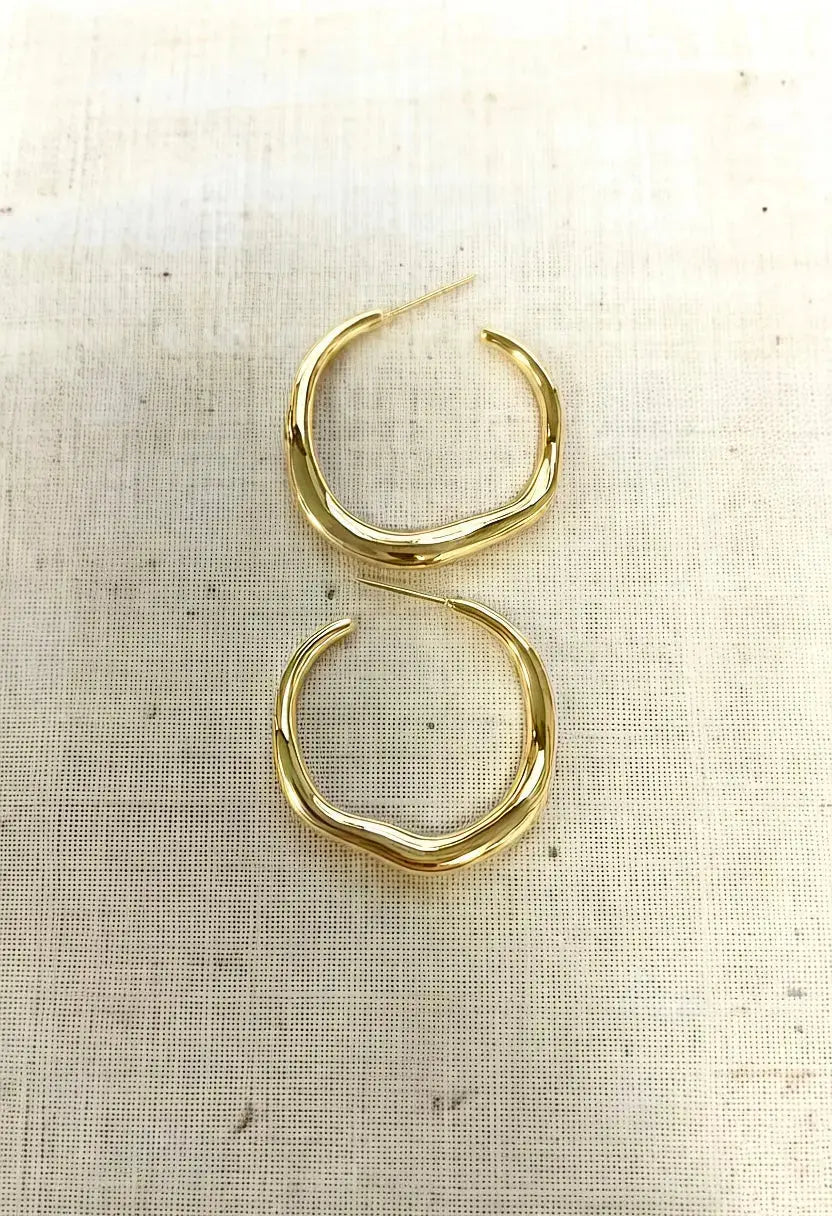An image of a   Organic Wavy Hoop Earrings by  Mirra Masa