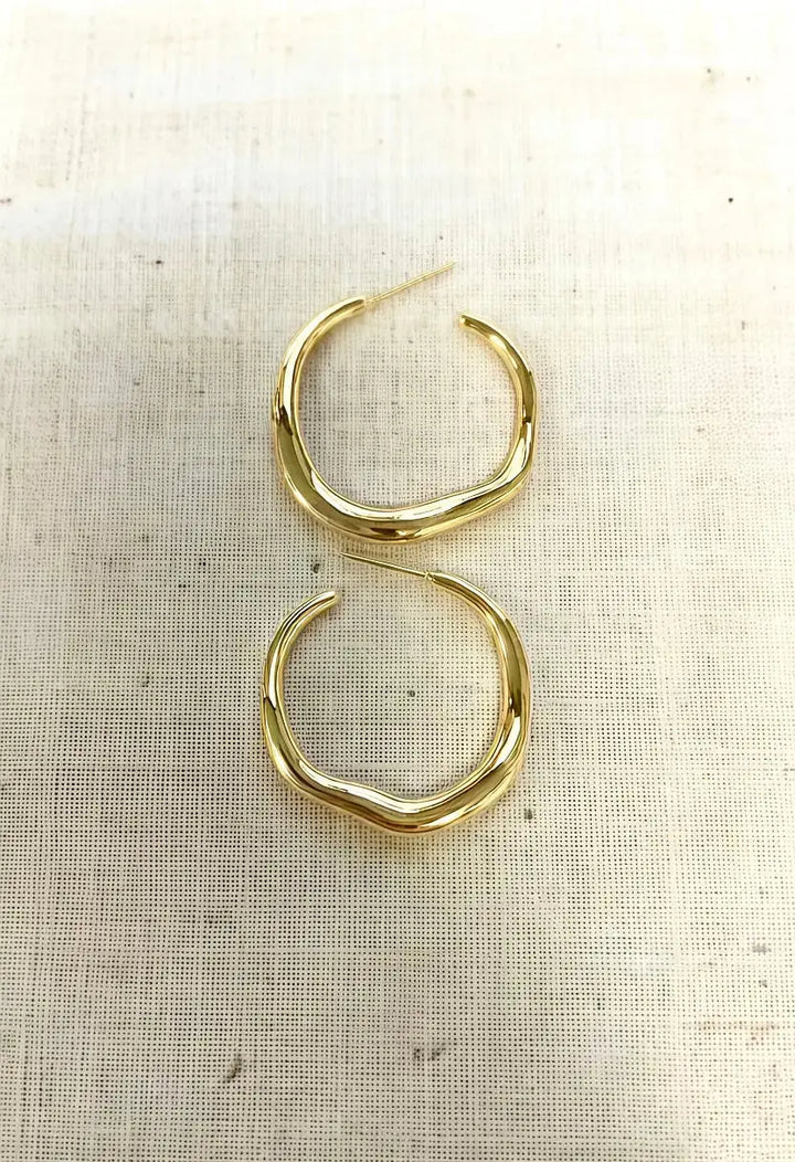 An image of a   Organic Wavy Hoop Earrings by  Mirra Masa