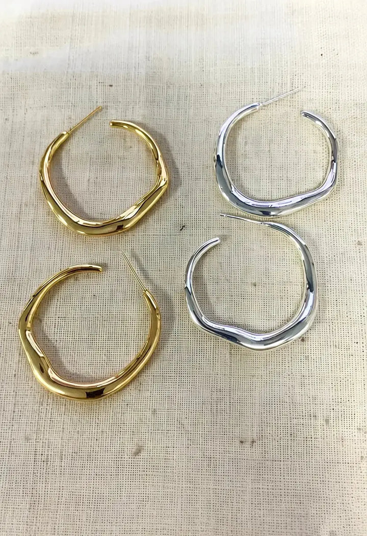 An image of a   Organic Wavy Hoop Earrings by  Mirra Masa