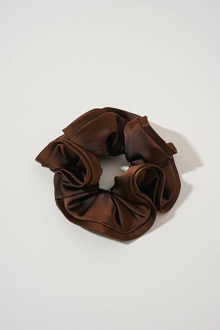 An image of a   Oversized Satin Cloud Scrunchie by  Mirra Masa