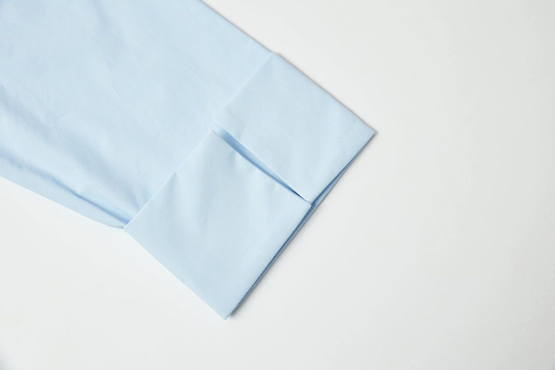 An image of a   PLW92S6 Ruffled Off-Shoulder Cropped Top by  Mirra Masa