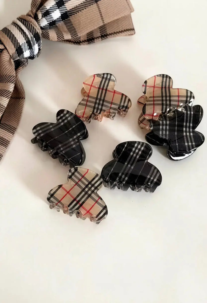 An image of a   Plaid Clover Hair Claw Mini Pair by  Mirra Masa