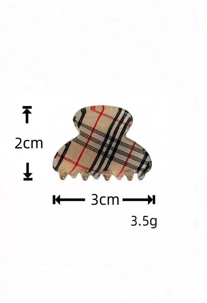 An image of a   Plaid Clover Hair Claw Mini Pair by  Mirra Masa