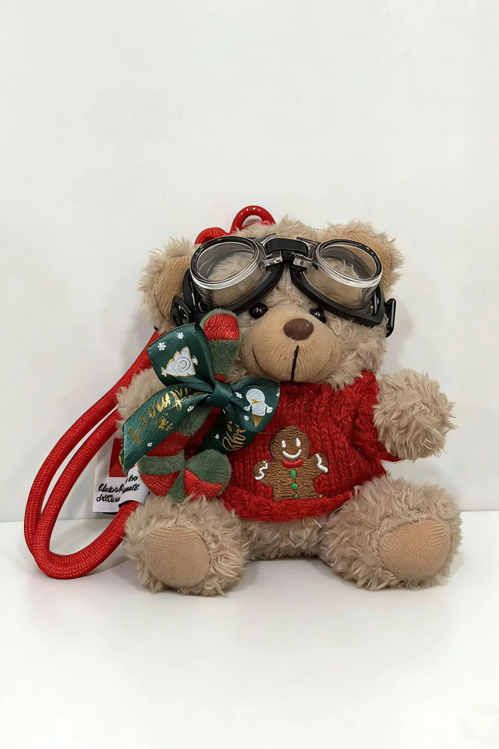 An image of a   Plush Bear Bag Charm by  Mirra Masa