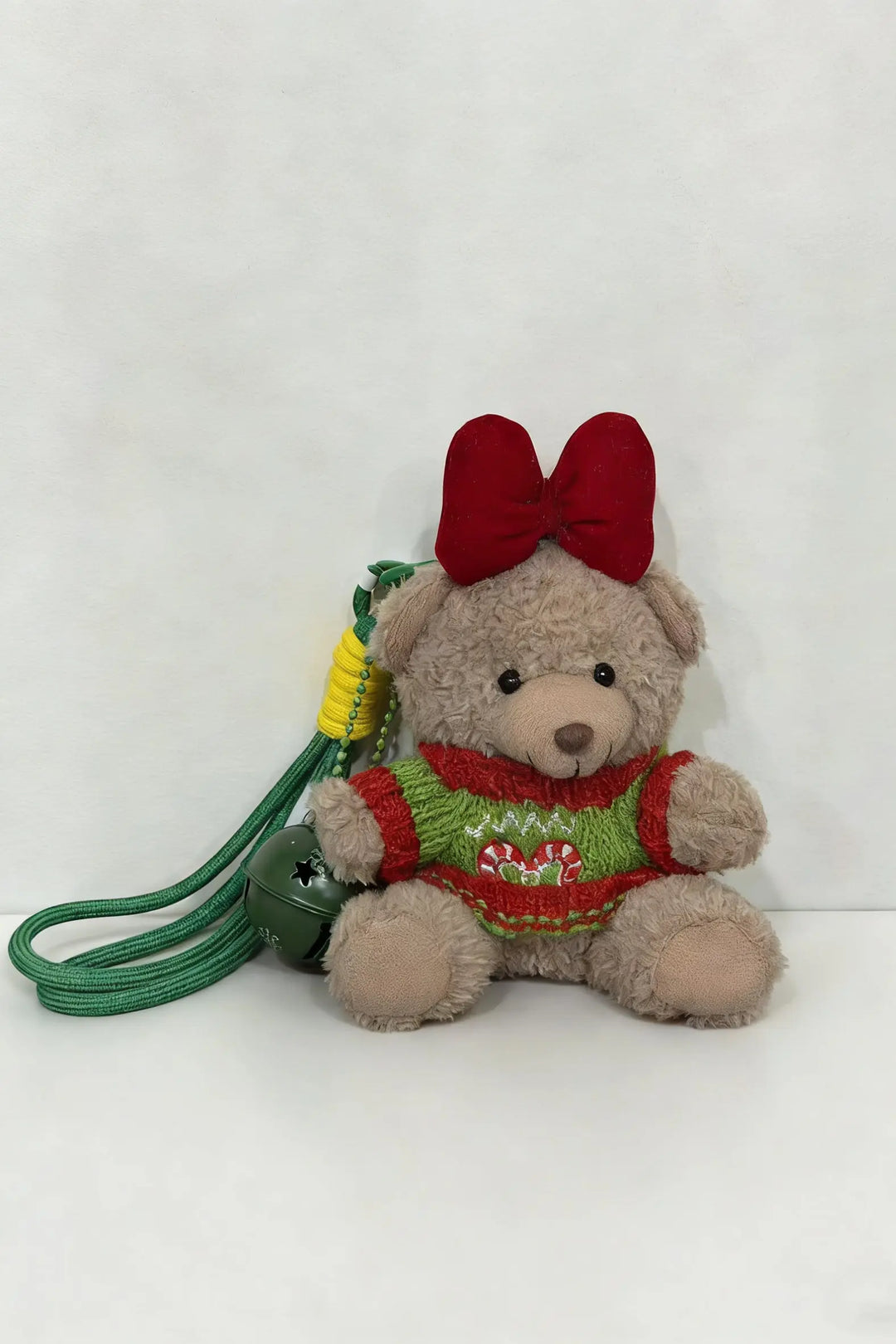 An image of a   Plush Bear Bag Charm by  Mirra Masa