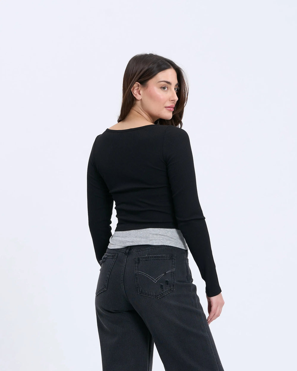 An image of a   S0532 Layered Knit Top by  Mirra Masa