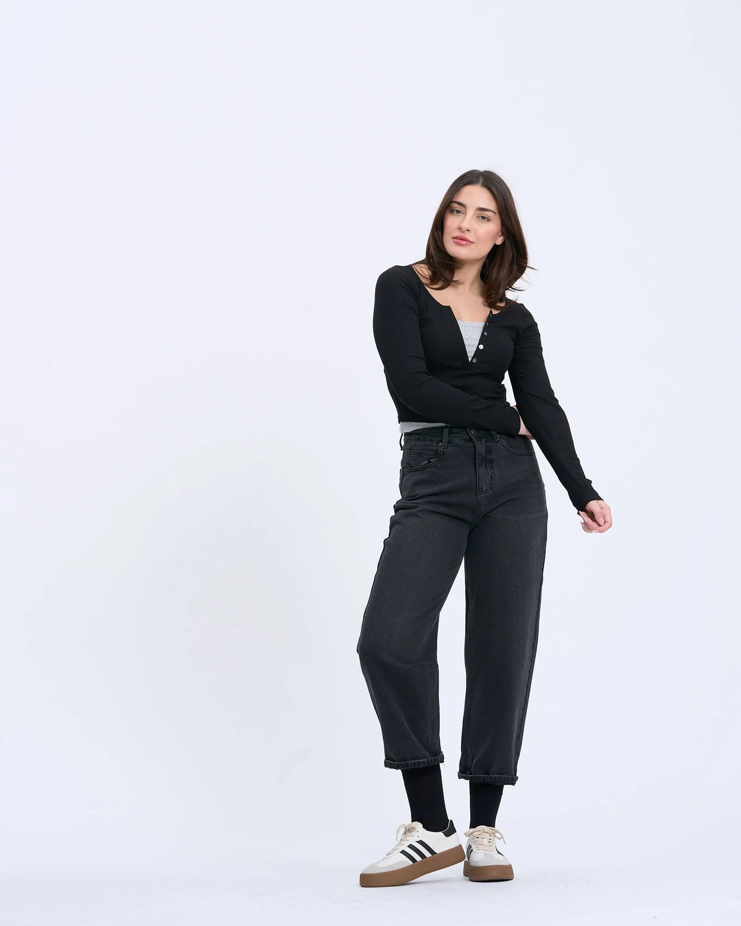 An image of a   S0532 Layered Knit Top by  Mirra Masa