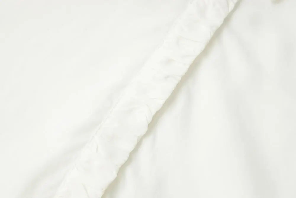 An image of a   S11309 Ruffle Placket Tencel Shirt by  Mirra Masa