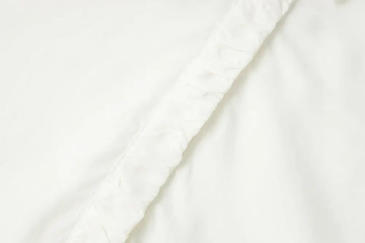 An image of a   S11309 Ruffle Placket Tencel Shirt by  Mirra Masa