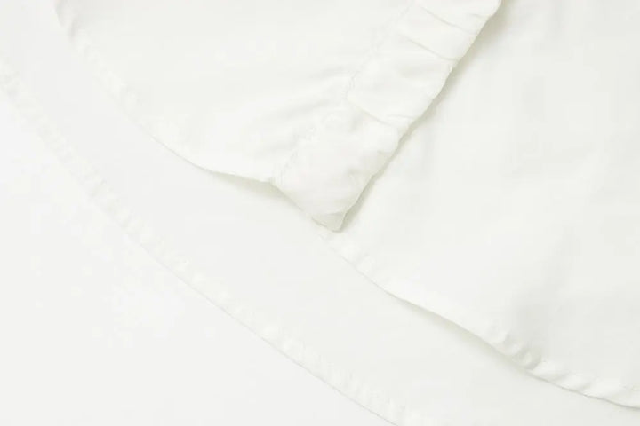 An image of a   S11309 Ruffle Placket Tencel Shirt by  Mirra Masa