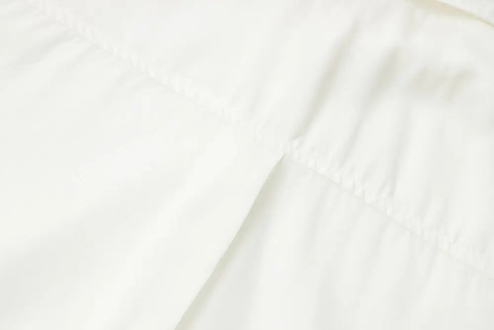 An image of a   S11309 Ruffle Placket Tencel Shirt by  Mirra Masa