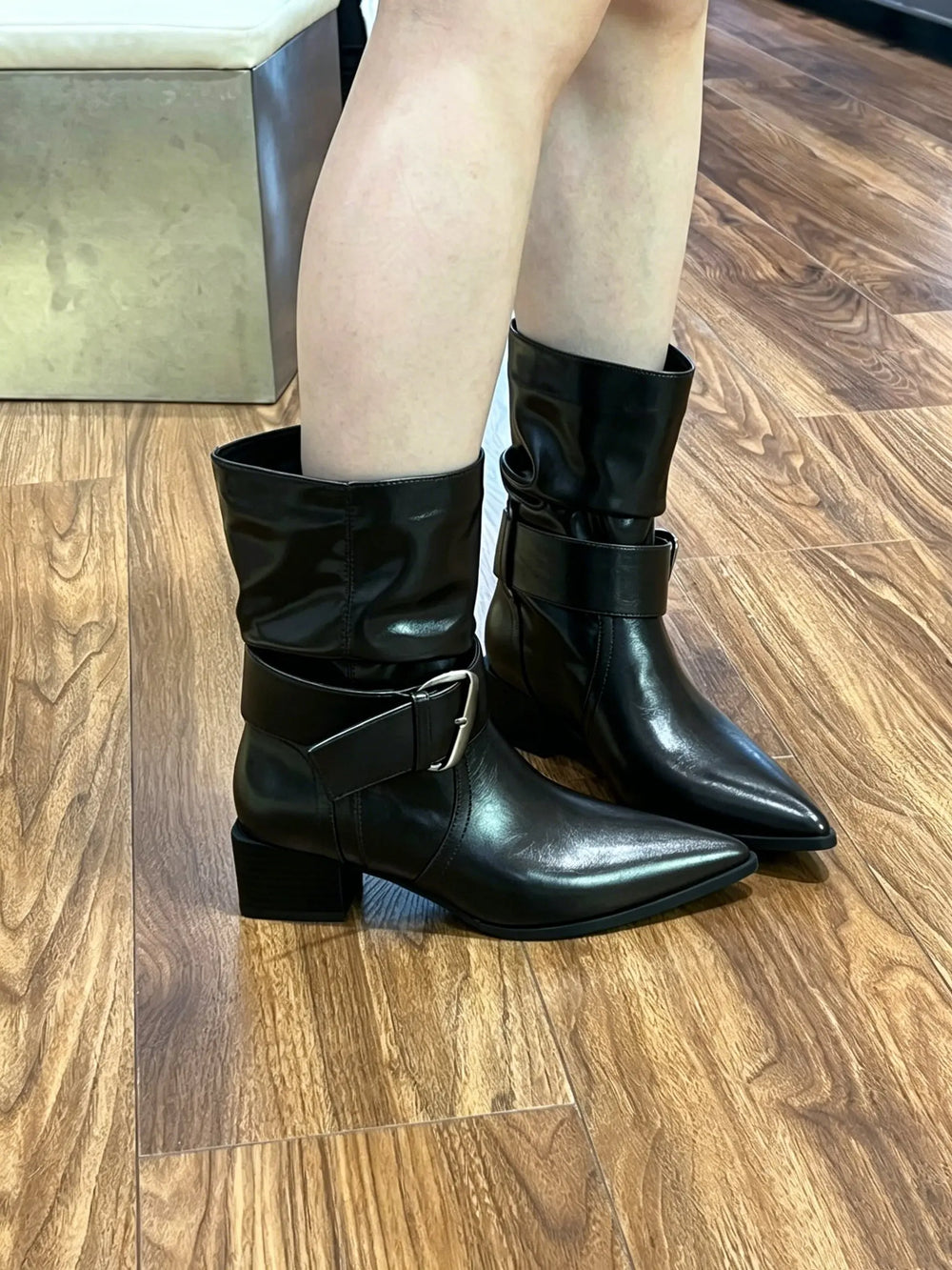An image of a   S1980 Buckle-Strap Pointed-Toe Ankle Boots by  Mirra Masa