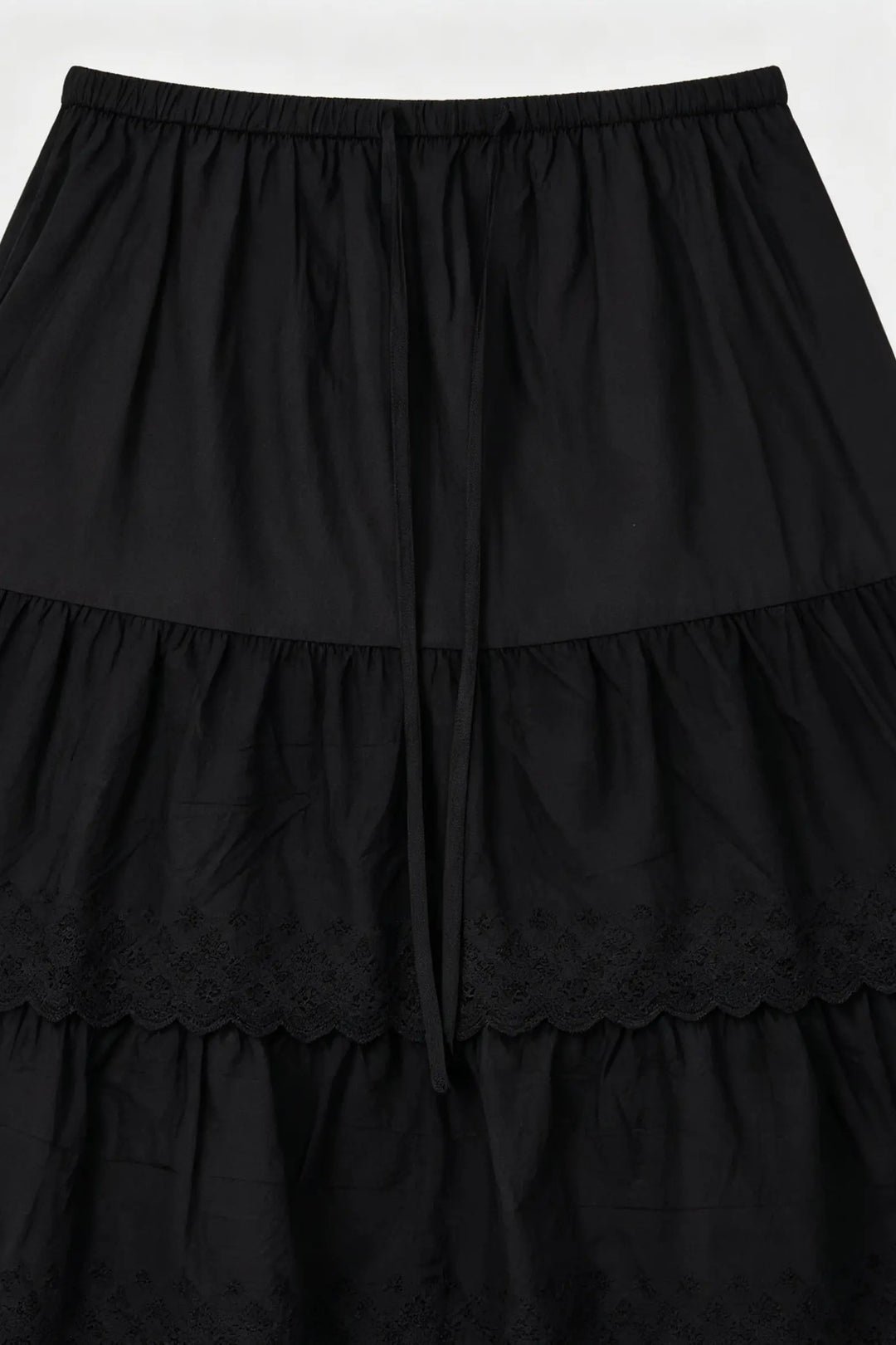 An image of a   S20187 Laced Tiered Mini Skirt by  Mirra Masa