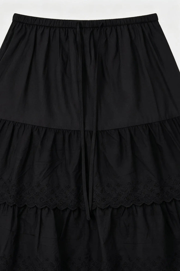 An image of a   S20187 Laced Tiered Mini Skirt by  Mirra Masa