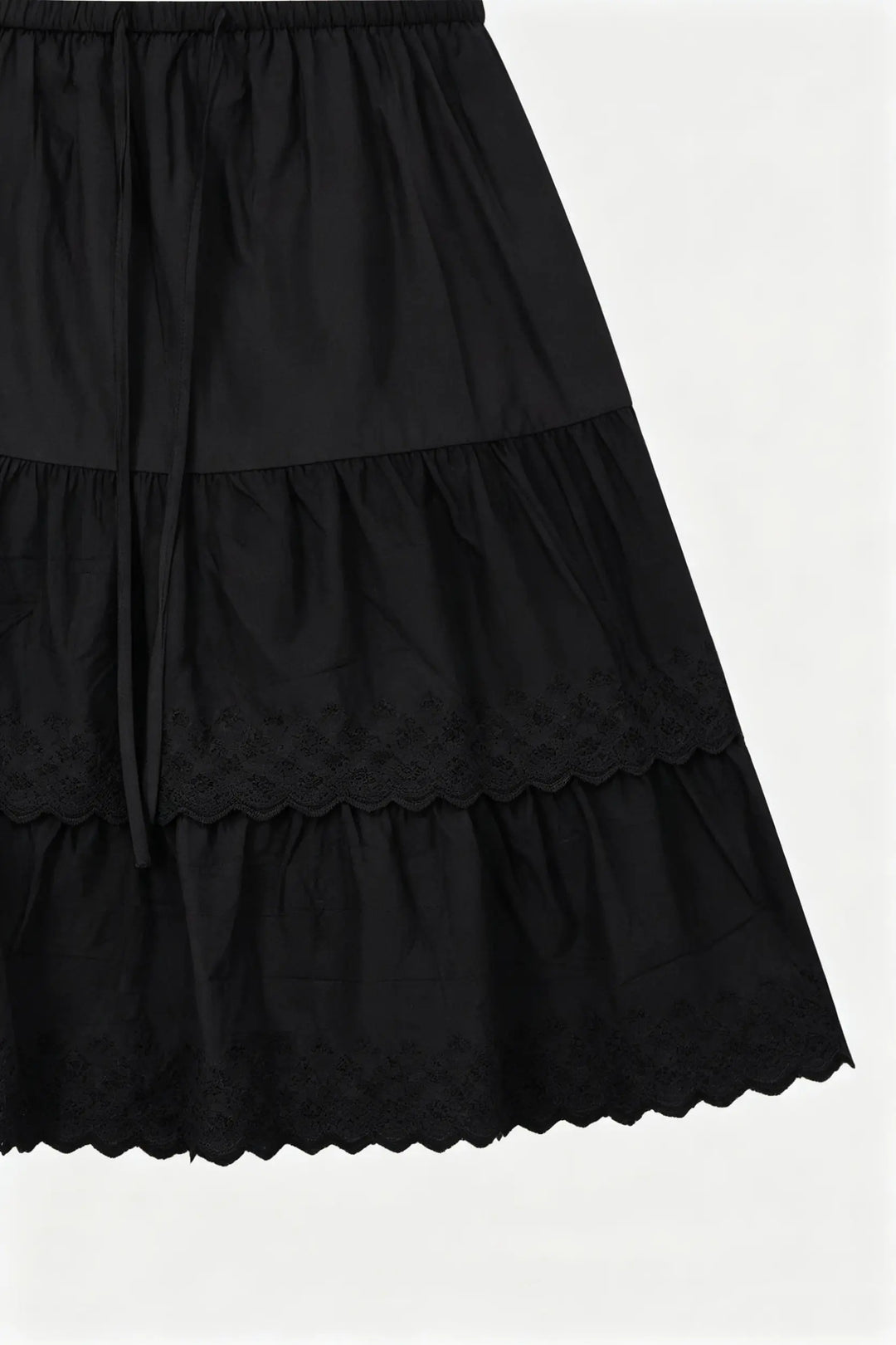 An image of a   S20187 Laced Tiered Mini Skirt by  Mirra Masa