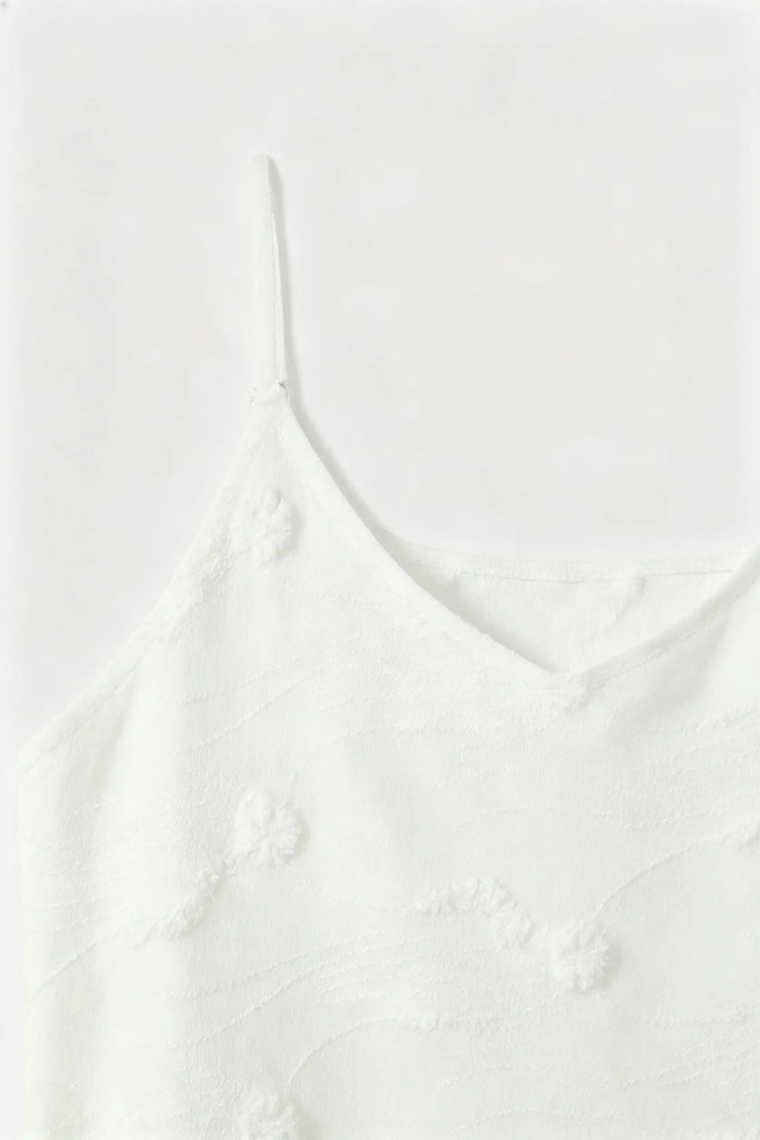 An image of a   S21268 Floral Appliqué Cami by  Mirra Masa
