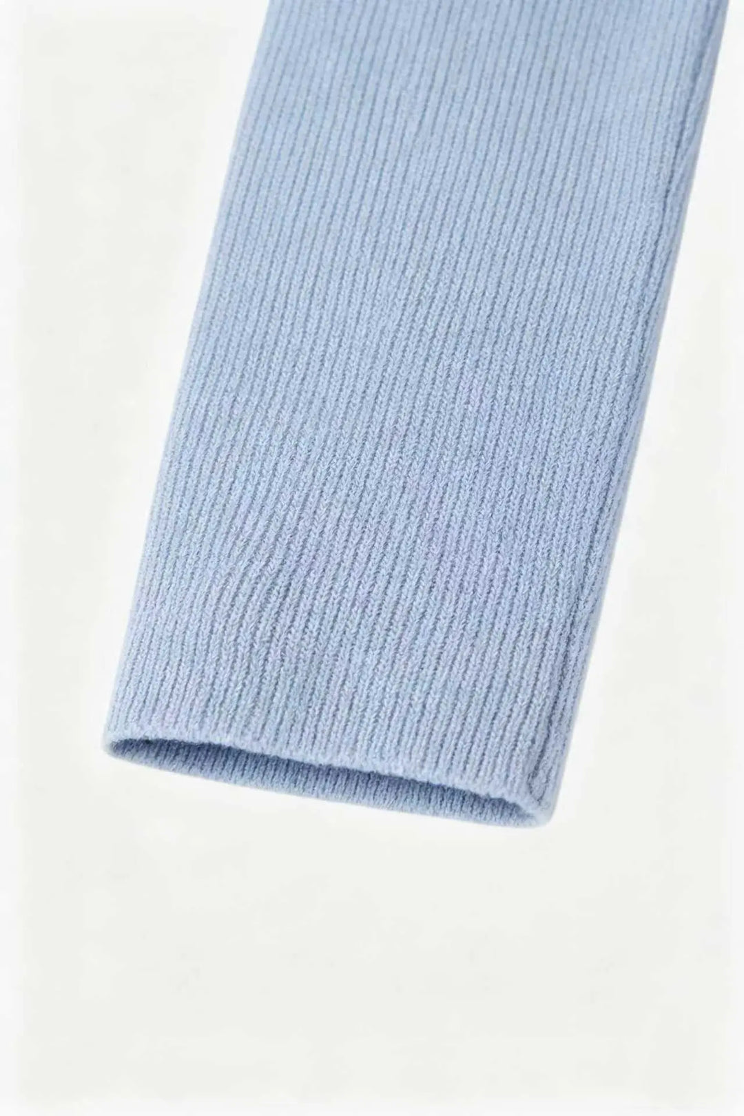 An image of a   S21304 Layered V-Neck Cardigan by  Mirra Masa