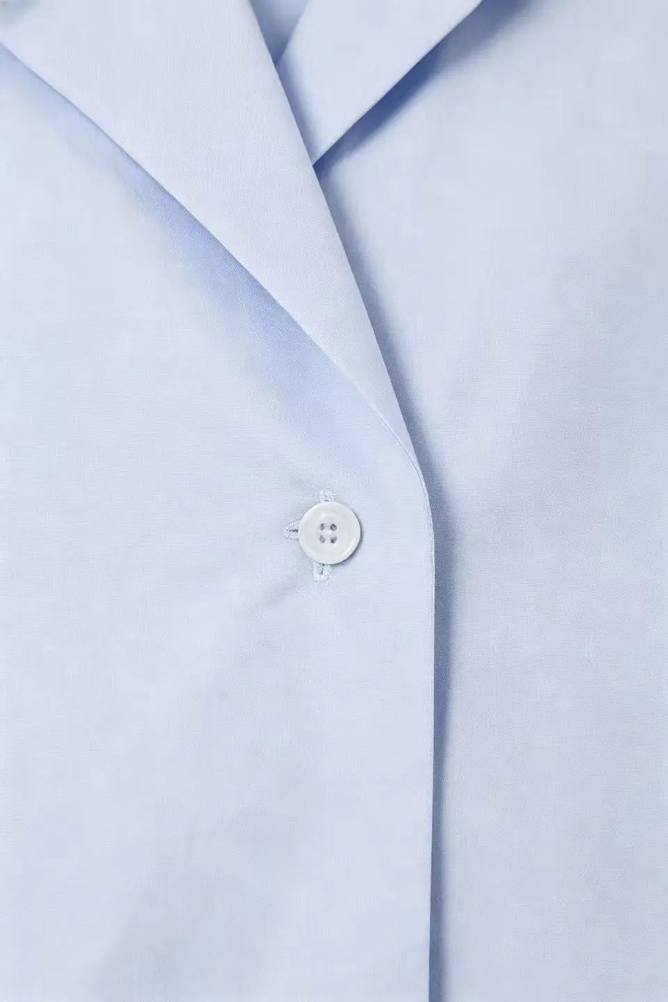 An image of a   S21406 Asymmetric Button-Down by  Mirra Masa