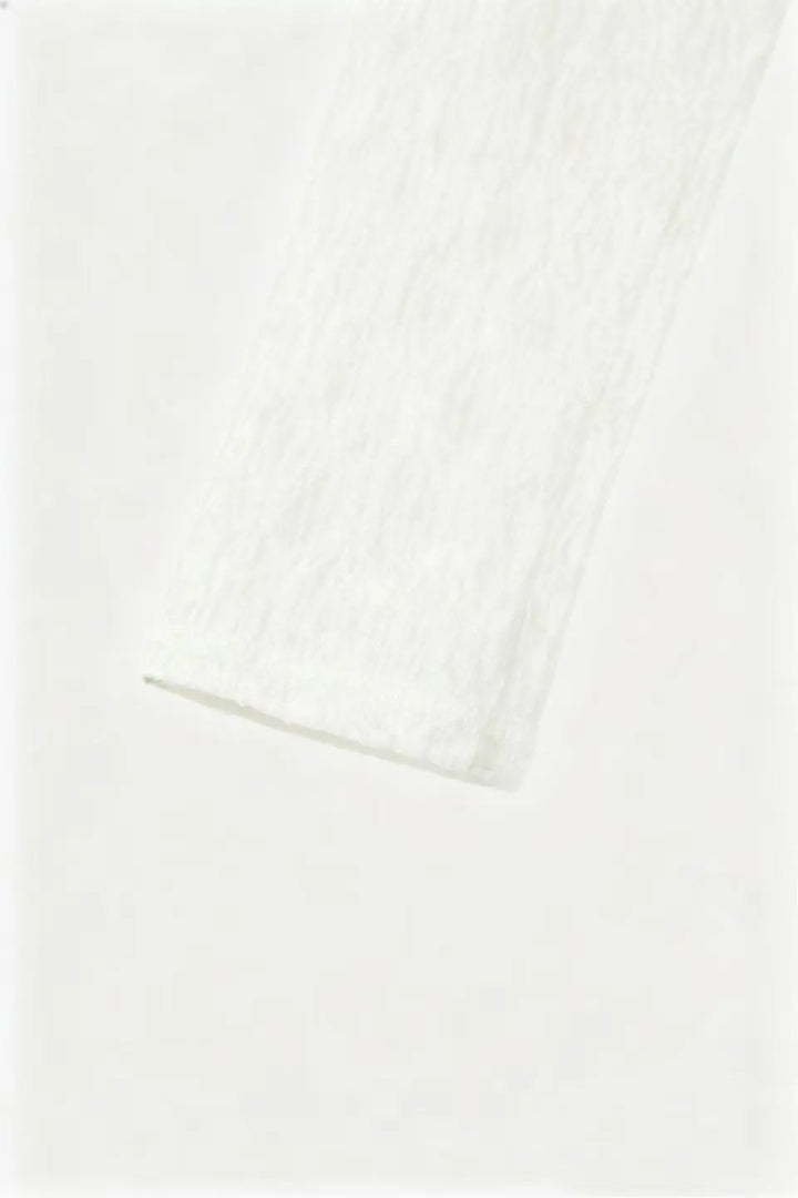 An image of a   S21482OL Lace Wrap Top by  Mirra Masa