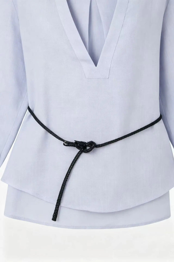 An image of a   S21618 Plunging V-Neck Blouse by  Mirra Masa