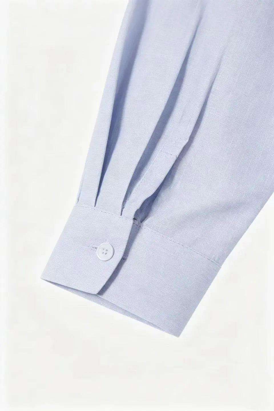 An image of a   S21618 Plunging V-Neck Blouse by  Mirra Masa