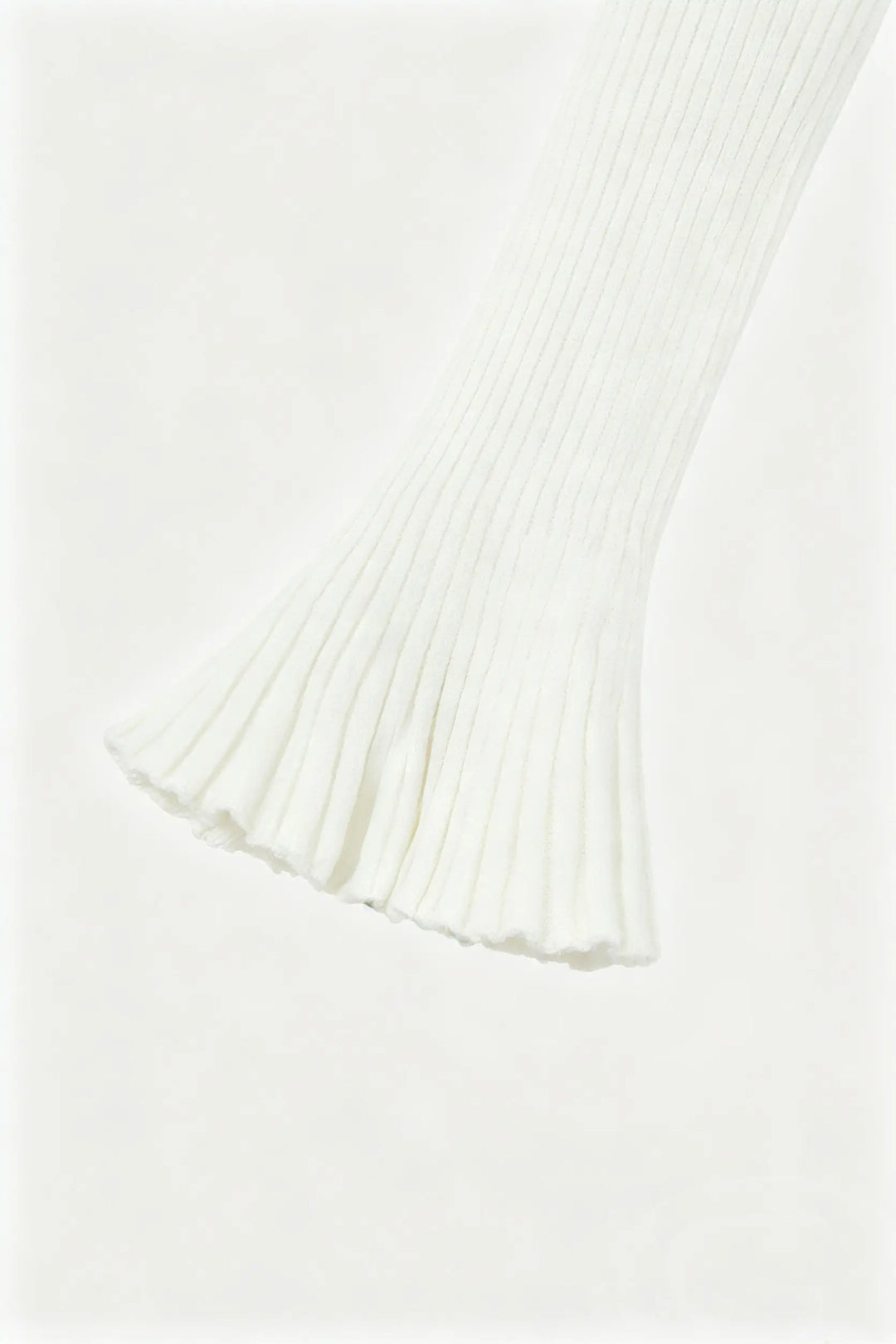An image of a   S21910 Bell Sleeve Ribbed Knit by  Mirra Masa