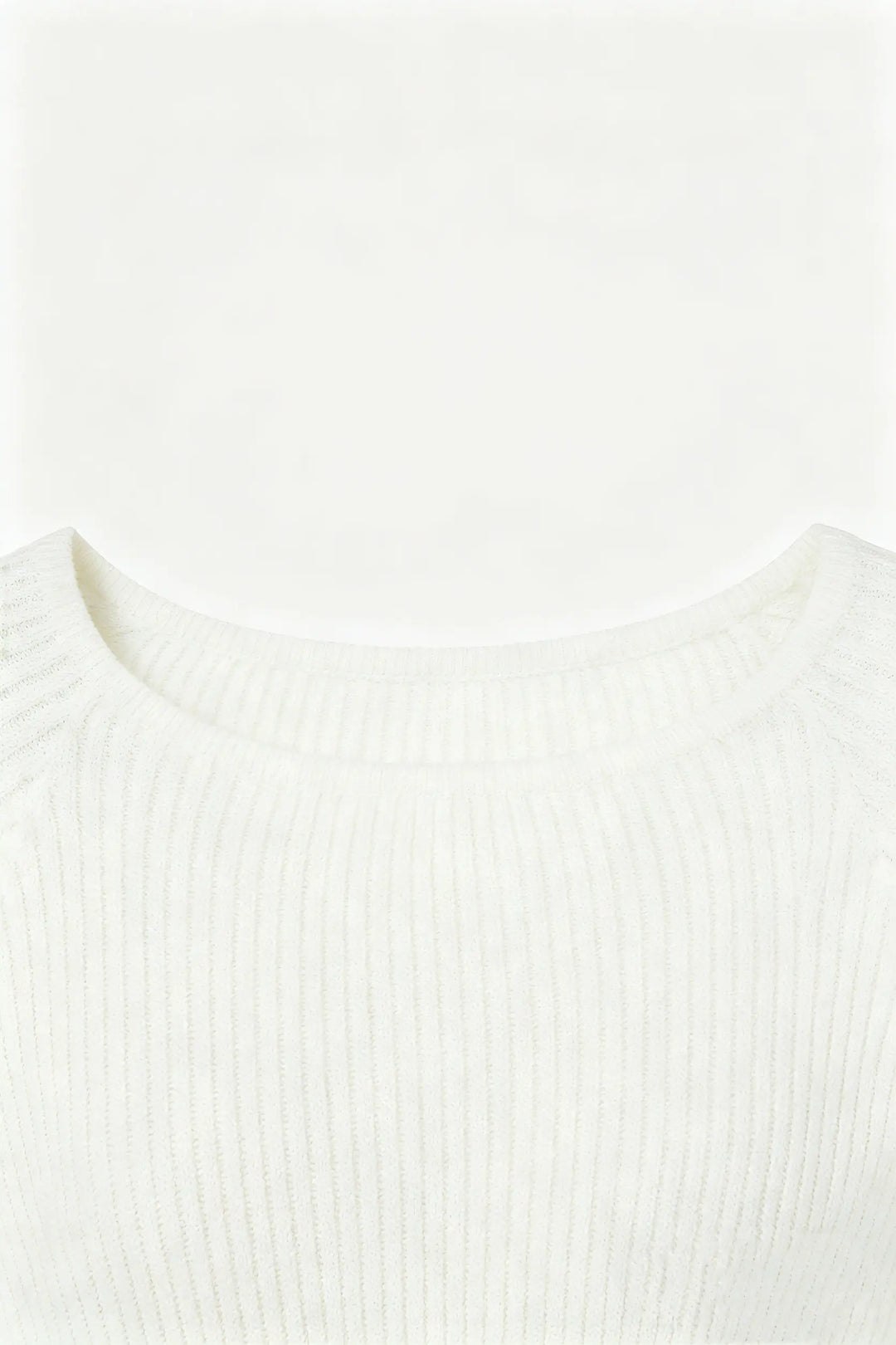 An image of a   S21910 Bell Sleeve Ribbed Knit by  Mirra Masa