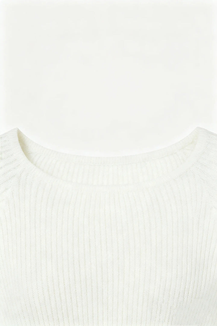 An image of a   S21910 Bell Sleeve Ribbed Knit by  Mirra Masa