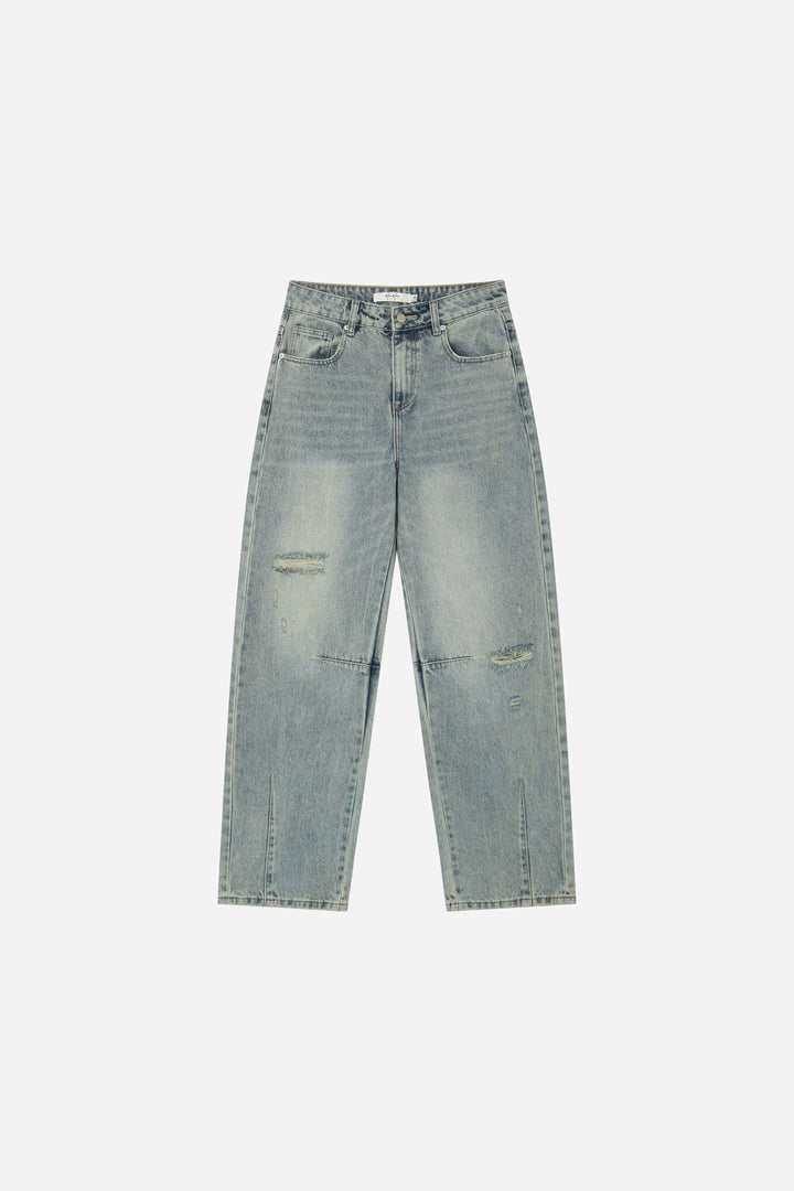 An image of a   S22918 Distressed Slit-Hem Jeans by  Mirra Masa