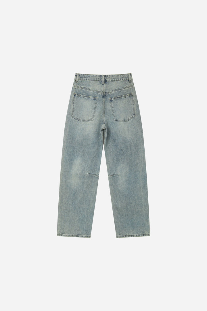 An image of a   S22918 Distressed Slit-Hem Jeans by  Mirra Masa