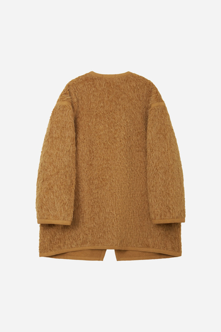 An image of a   S41274 V-Neck Teddy Jacket by  Mirra Masa