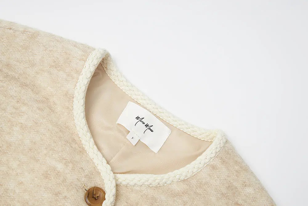 An image of a   S41584 Minimalist Wool Blend Button-Front Short Coat by  Mirra Masa