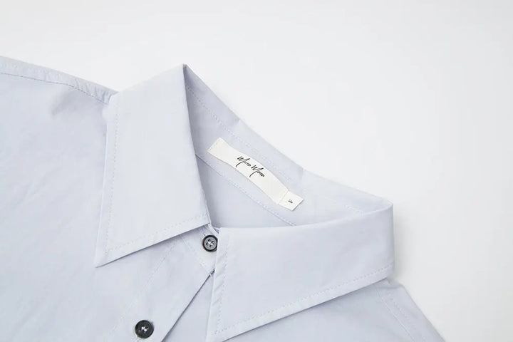 An image of a   S41838 Asymmetrical Side Twist Cotton Shirt by  Mirra Masa