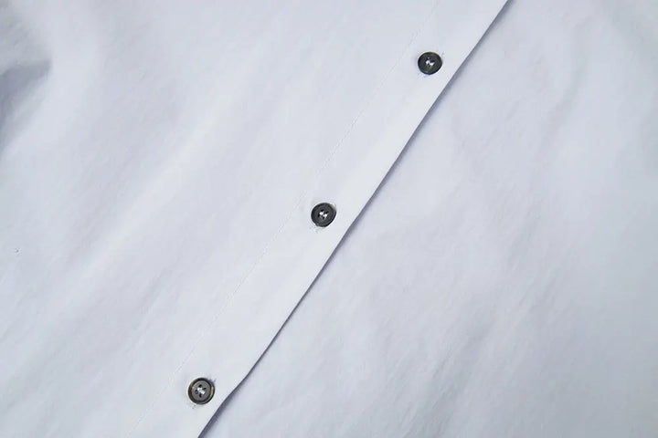 An image of a   S41838 Asymmetrical Side Twist Cotton Shirt by  Mirra Masa