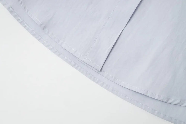 An image of a   S41838 Asymmetrical Side Twist Cotton Shirt by  Mirra Masa