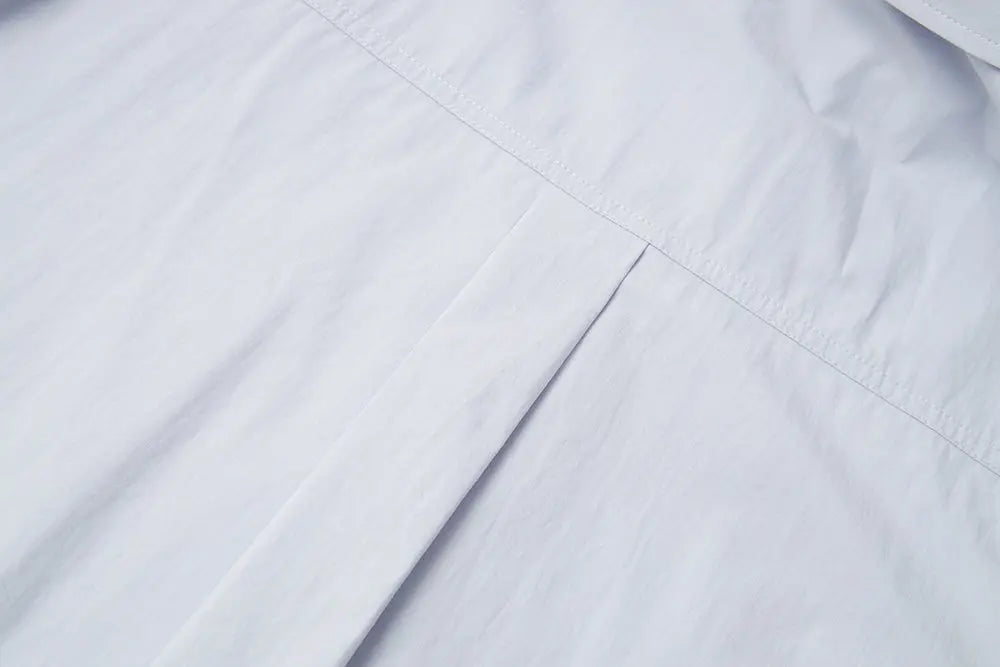 An image of a   S41838 Asymmetrical Side Twist Cotton Shirt by  Mirra Masa