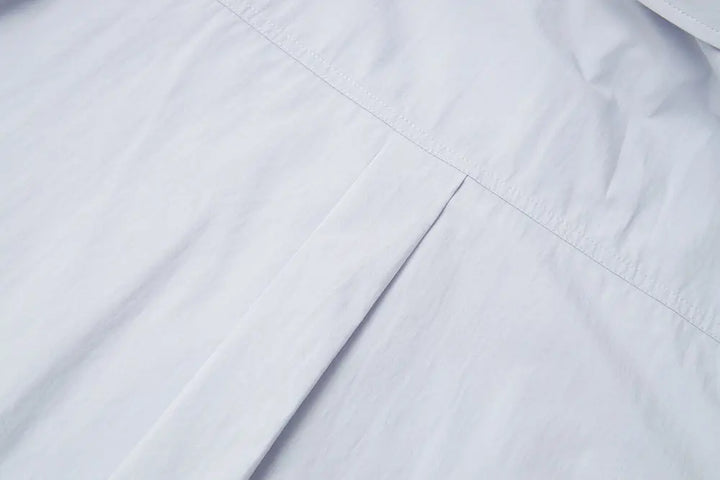 An image of a   S41838 Asymmetrical Side Twist Cotton Shirt by  Mirra Masa