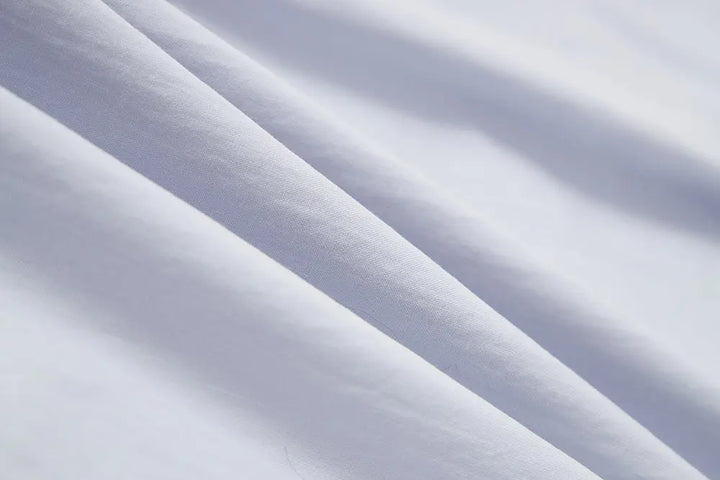 An image of a   S41838 Asymmetrical Side Twist Cotton Shirt by  Mirra Masa