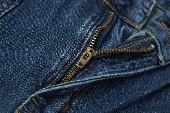 An image of a   S42290 Asymmetric Fold-Over Wide Leg Jeans by  Mirra Masa