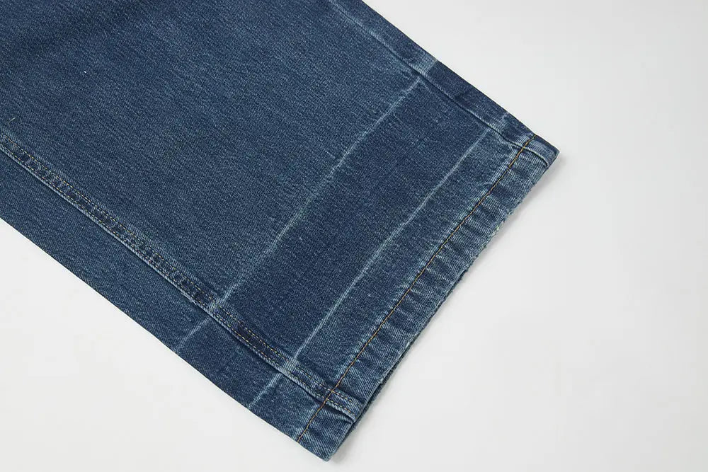 An image of a   S42290 Asymmetric Fold-Over Wide Leg Jeans by  Mirra Masa