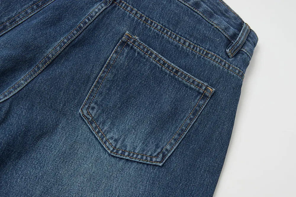 An image of a   S42290 Asymmetric Fold-Over Wide Leg Jeans by  Mirra Masa