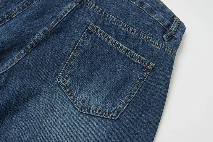 An image of a   S42290 Asymmetric Fold-Over Wide Leg Jeans by  Mirra Masa