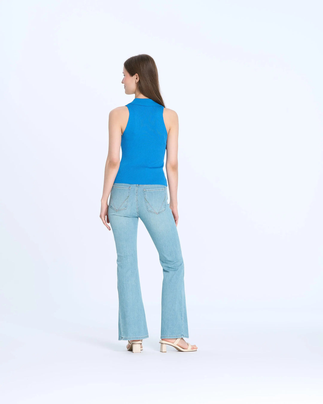 An image of a   S7851 Sleeveless Polo Top by  Mirra Masa