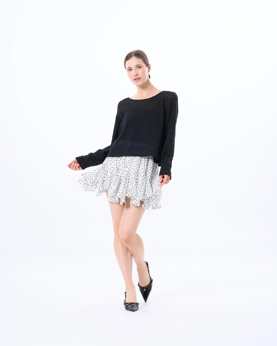 An image of a   SK03OM6 Ruffled Short Skirt by  Mirra Masa