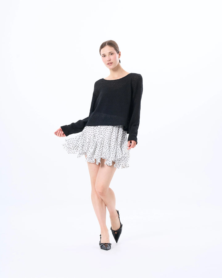 An image of a   SK03OM6 Ruffled Short Skirt by  Mirra Masa