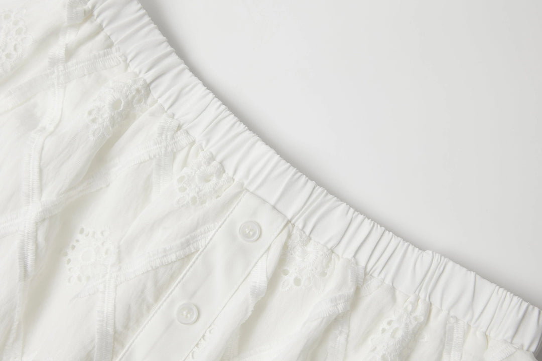 An image of a   SK7G9M6 Laced Skorts by  Mirra Masa