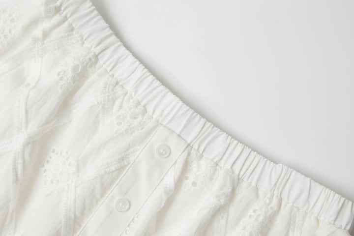 An image of a   SK7G9M6 Laced Skorts by  Mirra Masa