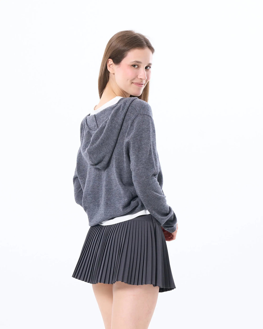 An image of a   SKT1N3M6 Pleated Mini Skirt by  Mirra Masa
