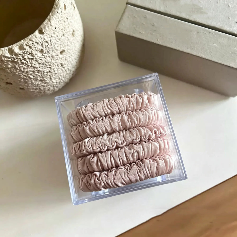 An image of a   Skinny Ruched Scrunchie Set by  Mirra Masa